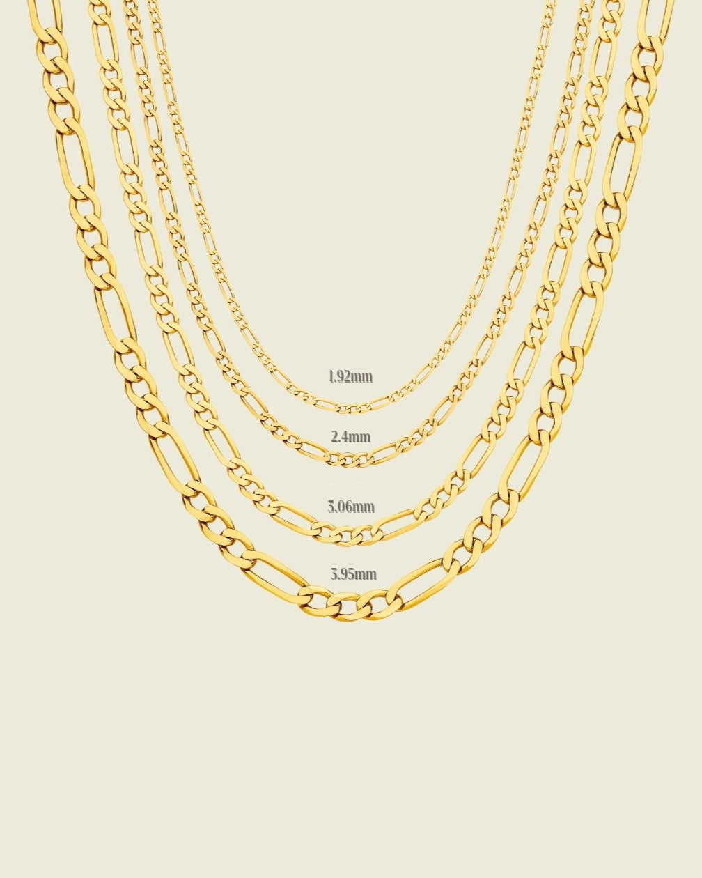 Gold chain necklace on a beige background