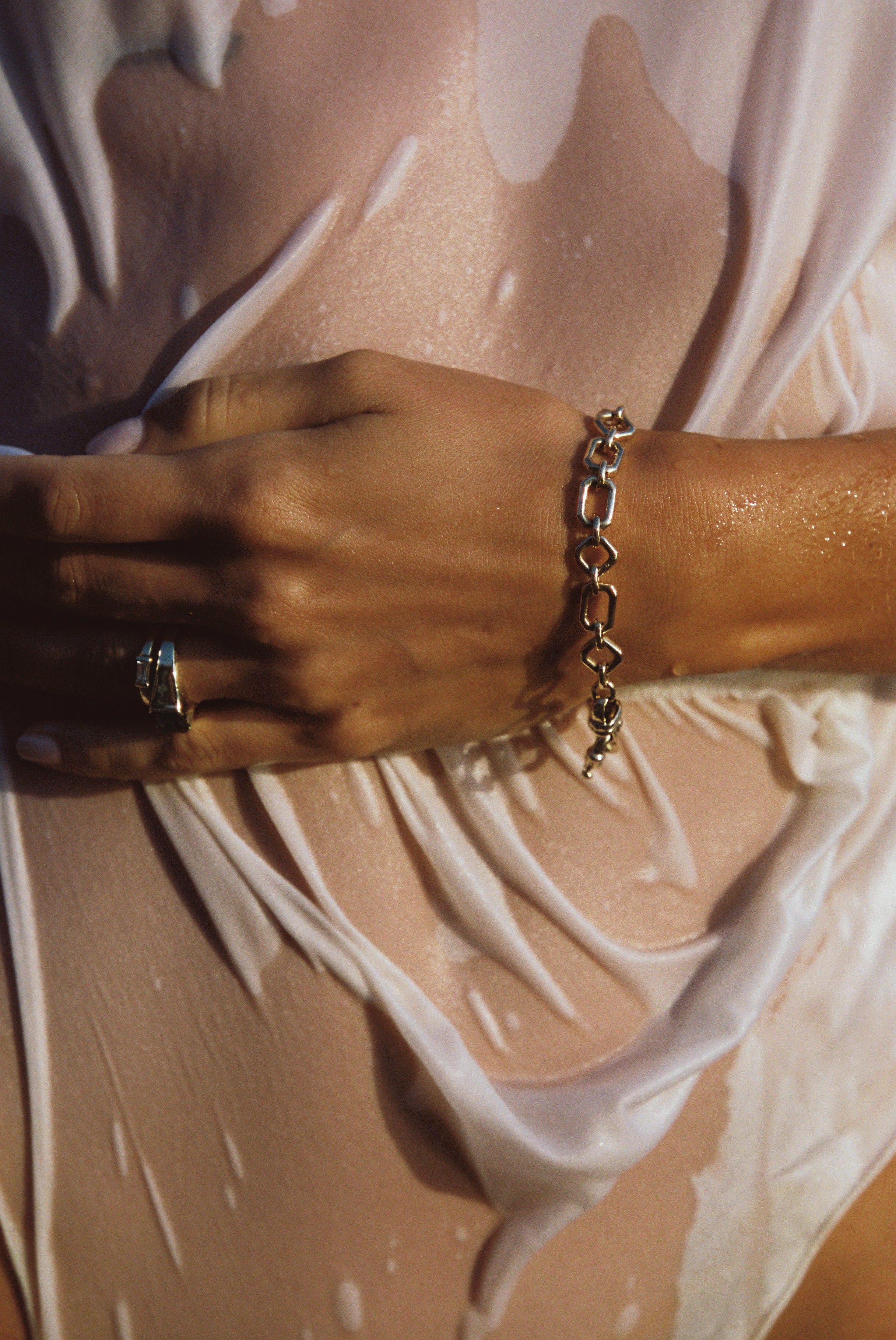 Handcrafted Gold Bracelet with 14 custom links. 26.5g of solid 18k Yellow Gold. Luma Campaign Shoot. 